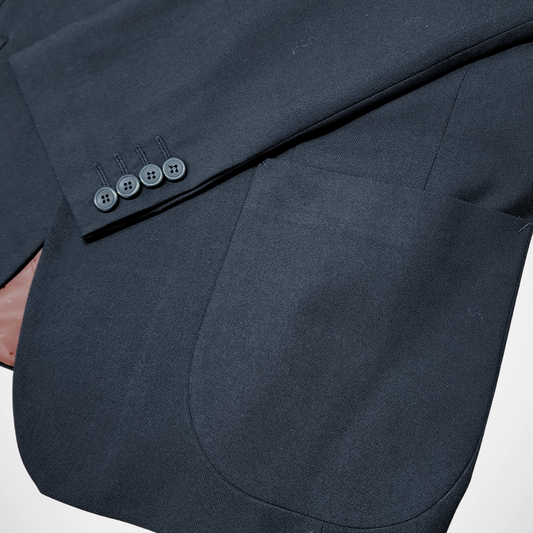 Traje casual  ModernFit lanilla stretch color negro bolsillo parche texturizado.