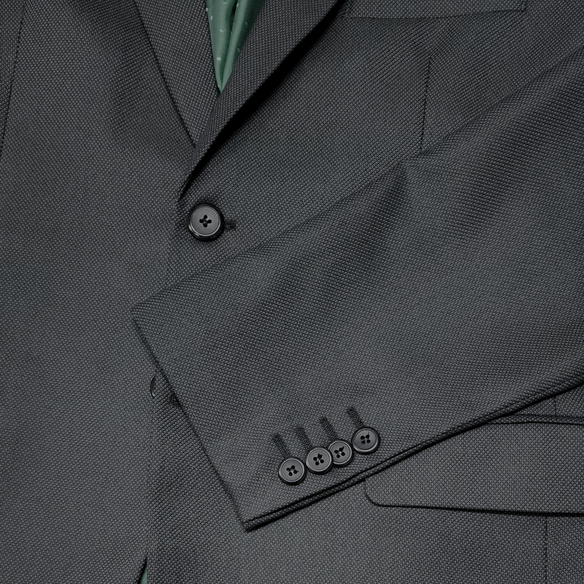 Traje ModernFit lanilla stretch color gris oscuro texturizado.