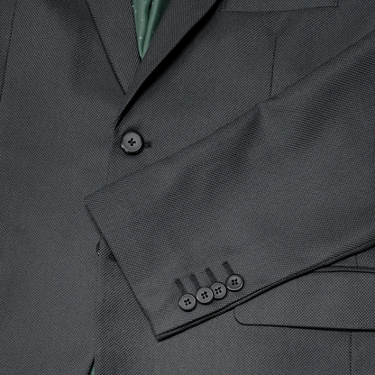 Traje ModernFit lanilla stretch color gris oscuro texturizado.