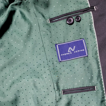 Traje ModernFit lanilla stretch color gris oscuro texturizado.