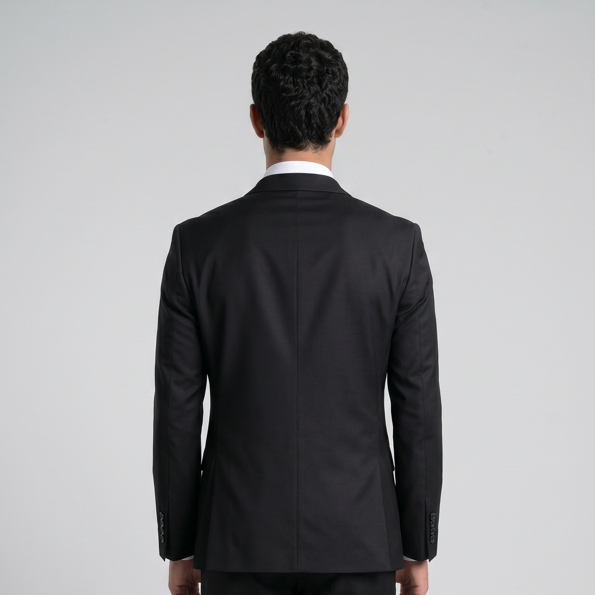 Traje ModernFit lanilla stretch color negro texturizado.